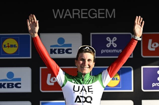 Italian Elisa Longo Borghini of UAE Team ADQ celebrates on the podium after winning the women elite race of the Dwars Door Vlaanderen cycling event, 128,5km from and to Waregem, Wednesday 02 April 2025. JASPERxJACOBS  x118341386x