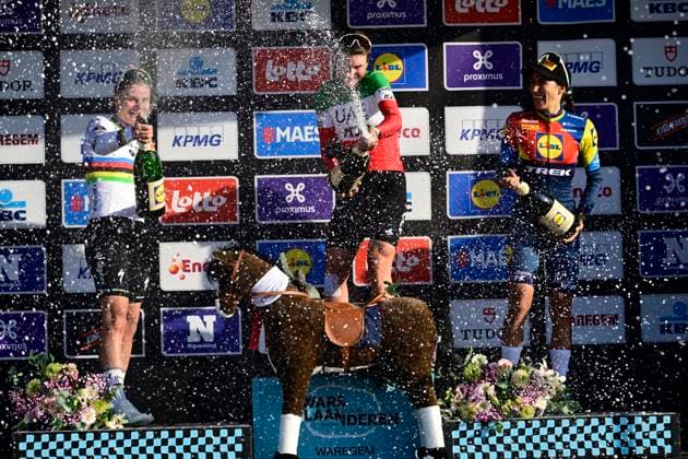 Dwars door Vlaanderen 2025 - Women Elite WAREGEM, BELGIUM - APRIL 02 : Kopecky Lotte (BEL) of Team SD Worx - Protime, Longo Borghini Elisa (ITA) of UAE Team ADQ and Balsamo Elisa (ITA) of Lidl - Trek pictured during the podium ceremony of the 14th edition of the UCI Women s World Tour Dwars door Vlaanderen Women Elite cycling race with start and finish in Waregem after 128,5 km on April 2, 2025 in Waregem, Belgium, 02 04 2025 ( motor driver - Waregem Belgium  Copyright: xPeterxDexVoechtx