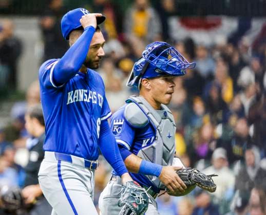 Kansas City Royals relief pitcher Lucas Erceg (L) walks with Kansas City Royals catcher Freddy Fermin (R) at the end of the seventh inning of the MLB, Baseball Herren, USA baseball game between the Kansas City Royals and the Milwaukee Brewers at American Family Field in Milwaukee, Wisconsin on Wednesday, April 02, 2025.  MIL20250402822 TANNENxMAURY