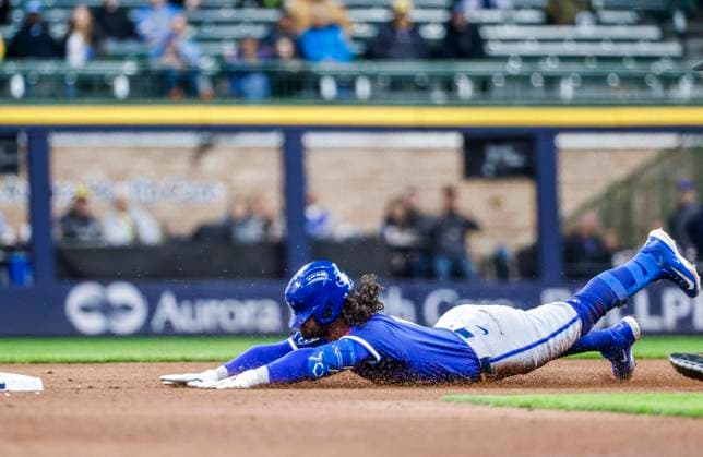 Kansas City Royals third baseman Jonathan India slides into second base as he hits a double in the ninth inning of the MLB, Baseball Herren, USA baseball game between the Kansas City Royals and the Milwaukee Brewers at American Family Field in Milwaukee, Wisconsin on Wednesday, April 02, 2025.  MIL20250402826 TANNENxMAURY