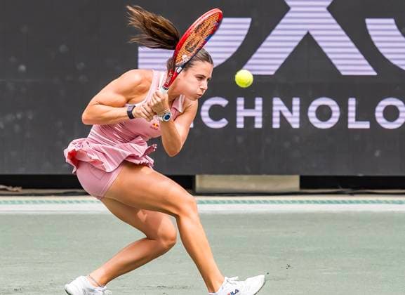 April 2, 2025, Daniel Island, Sc, USA: EMMA NAVARRO (4) (USA) returns a volley to Hailey Baptiste (USA) during their match at the Credit One Stadium in Daniel Island, SC. Navarro defeats Baptiste 4-6, 3-6 and moves on to the 3rd round. Daniel Island USA - ZUMAa161 20250402_aaa_a161_171 Copyright: xWalterxG.xArcexSr.x