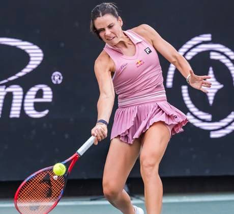 April 2, 2025, Daniel Island, Sc, USA: EMMA NAVARRO (4) (USA) returns a volley to Hailey Baptiste (USA) during their match at the Credit One Stadium in Daniel Island, SC. Navarro defeats Baptiste 4-6, 3-6 and moves on to the 3rd round. Daniel Island USA - ZUMAa161 20250402_aaa_a161_155 Copyright: xWalterxG.xArcexSr.x