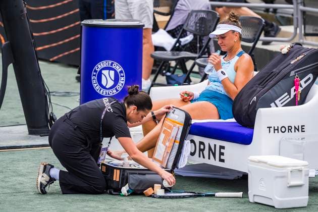 April 2, 2025, Daniel Island, Sc, USA: IRYNA SHMANOVICH (Q) (RUS) takes a medical timeout to have her foot re wrapped during her match against Jessica Pegula (1) USA) at the Credit One Charleston Open on Daniel Island, SC. Pegula defeats Shmanovich 6-0, 6-3 to move to the 3rd round. Daniel Island USA - ZUMAa161 20250402_aaa_a161_249 Copyright: xWalterxG.xArcexSr.x