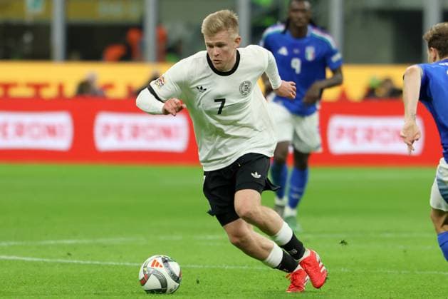 JONATHAN BURKARDT, Germania, Nations League, 2024-25, Quarter Finals 1st Leg, Italy vs Germany 1-2, 20-03-2025, Azione, Contrasto, Action, Single shot NATIONS LEAGUE 2024-25 Quarto di Finale andata ITALIA-GERMANIA 1