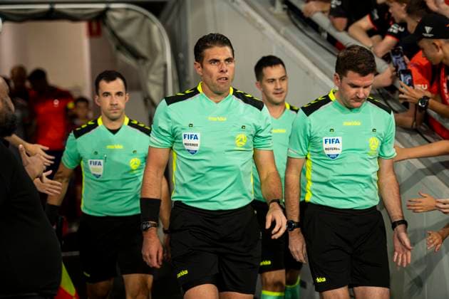 4th April 2025; Suncorp Stadium, Brisbane, Queensland, Australia: A League Football, Brisbane Roar versus Macarthur FC; referee Shaun Evans leads the team of officials onto the pitch  ActionPlus12769291 NigelxOwen Content restricted for UK based newspaper