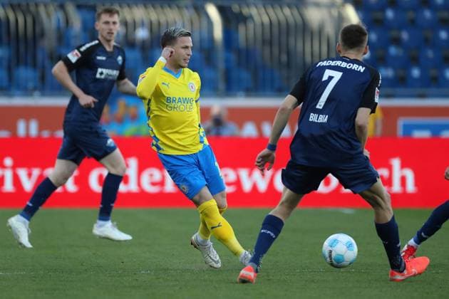 Braunschweig vs Paderborn, 2 BL Braunschweig, 04 04 2025, FOOTBALL Eintracht Braunschweig vs SC Paderborn 07, 2 BL, Season 2024 25 Lino Tempelmann Eintracht Braunschweig , Filip Bilbija SC Paderborn Braunschweig