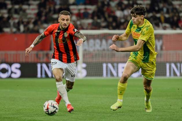 FOOTBALL : NICE vs NANTES - ligue 1 - 4 4 25 Nice™s defender 92 Jonathan Clauss and FC Nantes s Louis Leroux - French L1 football match between OGC Nice and FC Nantes at Allianz Riviera Stadium of Nice, south France, on April 4, 2025. NICEFrance  Copyright: xfredxDIDES psnewzx