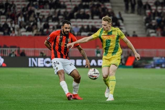 FOOTBALL : NICE vs NANTES - ligue 1 - 4 4 25 Nice™s forward 24 Gaetan Laborde and FC Nantes s defender 3 Nicolas Cozza - French L1 football match between OGC Nice and FC Nantes at Allianz Riviera Stadium of Nice, south France, on April 4, 2025. NICEFrance  Copyright: xfredxDIDES psnewzx