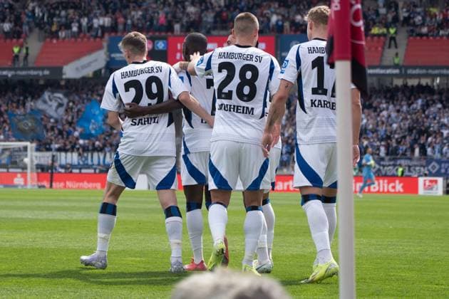 05 04 2025, xhfmx, Soccer 2 Bundesliga, 1 FC Nuernberg Hamburger SV v l Emir Sahiti Hamburger SV , Jean Luc Dompe Hamburger SV , Miro Muheim Hamburger SV , Adam Karabec Hamburger SV celebrate the 2 0 in Nuremberg DFL DFB REGULATIONS PROHIBIT ANY USE OF PHOTOGRAPHS as IMAGE SEQUENCES and or QUASI VIDEO Nuernberg