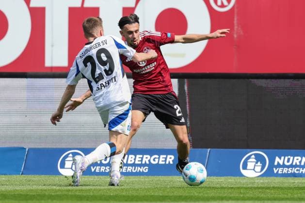 Duel Berkay YÄ±lmaz 21 1FC Nuernberg with Emir Sahiti 29 Hamburger SV , 1 FC Nuernberg vs Hamburger SV, Fußball, 2 Bundesliga, 28 Spieltag, 05 04 2025 DFB regulations prohibit any use of photographs as image sequences and or quasi video Copyright: xkolbert-press MartinxAgüerax