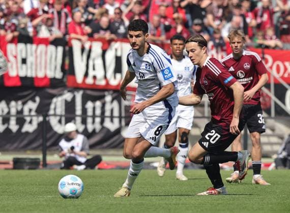 05 04 2025 Soccer Season 2024 2025 2 Soccer Bundesliga 28 Matchday 1 FC Nürnberg FCN Club Hamburger SV HSV Sportfoto Zink DaMa xdaxmax DFL regulations prohibit any use of photographs as image sequences and or quasi video only for editorial use Daniel Elfadli 8, Hamburger SV HSV Caspar Jander 20, 1 FC Nürnberg FCN