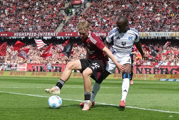 05 04 2025 Soccer Season 2024 2025 2 Soccer Bundesliga 28 Matchday 1 FC Nürnberg FCN Club Hamburger SV HSV Sportfoto Zink DaMa xdaxmax DFL regulations prohibit any use of photographs as image sequences and or quasi video only for editorial use Tim Janisch 32, 1 FC Nürnberg FCN Jean Luc Dompe 7, Hamburger SV HSV