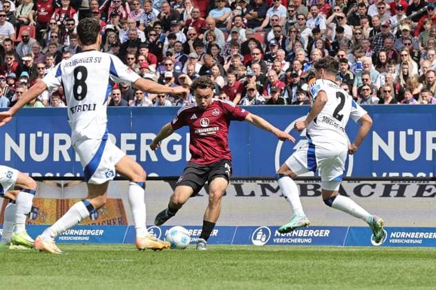 05 04 2025 Soccer Season 2024 2025 2 Soccer Bundesliga 28 Matchday 1 FC Nürnberg FCN Club Hamburger SV HSV Sportfoto Zink DaMa xdaxmax DFL regulations prohibit any use of photographs as image sequences and or quasi video only for editorial use Rafael Lubach 18, 1 FC Nürnberg FCN with shot on goal