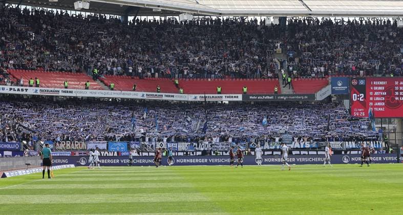 05 04 2025 Soccer Season 2024 2025 2 Soccer Bundesliga 28 Matchday 1 FC Nürnberg FCN Club Hamburger SV HSV Sportfoto Zink DaMa xdaxmax DFL regulations prohibit any use of photographs as image sequences and or quasi video only for editorial use Symbolbild Symbolfoto Feature Impression Schalparade der Zuschauer Publikum Fans des Hamburger SV HSV
