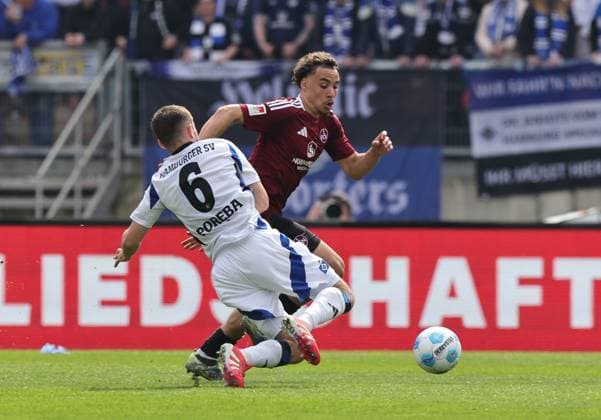 05 04 2025 Soccer Season 2024 2025 2 Soccer Bundesliga 28 Matchday 1 FC Nürnberg FCN Club Hamburger SV HSV Sportfoto Zink DaMa xdaxmax DFL regulations prohibit any use of photographs as image sequences and or quasi video only for editorial use Lukasz Poreba 6, Hamburger SV HSV Rafael Lubach 18, 1 FC Nürnberg FCN