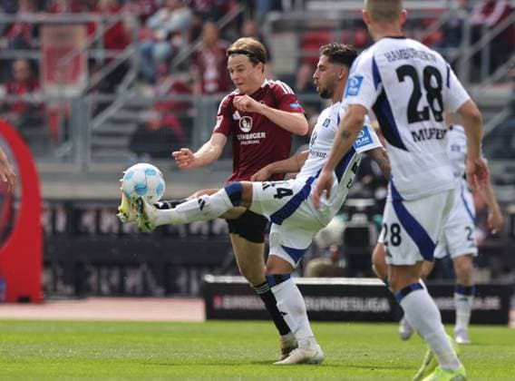 05 04 2025 Soccer Season 2024 2025 2 Soccer Bundesliga 28 Matchday 1 FC Nürnberg FCN Club Hamburger SV HSV Sportfoto Zink DaMa xdaxmax DFL regulations prohibit any use of photographs as image sequences and or quasi video only for editorial use Caspar Jander 20, 1 FC Nürnberg FCN Ludovit Reis 14, Hamburger SV HSV