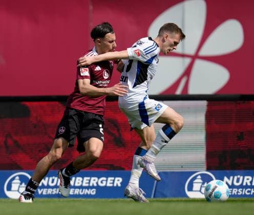 Berkay Yılmaz 1 FC Nuernberg, 21 vs Emir Sahiti Hamburger SV, 29 GER, 1 FC Nuernberg vs Hamburger SV, 2 Bundesliga, 28 Matchday, Season 2024 2025, 05 04 2025 DFL REGULATIONS PROHIBIT ANY USE OF PHOTOGRAPHS AS IMAGE SEQUENCES AND OR QUASI VIDEO GER, 1 FC Nuernberg vs Hamburger SV, 2 Bundesliga, 28 Matchday, Season 2024 2025, 05 04 2025 Nuernberg Copyright: xEibner-Pressefoto ScottxColemanx EP_SCN