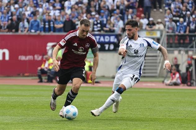 05 04 2025 Soccer Season 2024 2025 2 Soccer Bundesliga 28 Matchday 1 FC Nürnberg FCN Club Hamburger SV HSV Sportfoto Zink DaMa xdaxmax DFL regulations prohibit any use of photographs as image sequences and or quasi video only for editorial use Julian Justvan 10, 1 FC Nürnberg FCN Ludovit Reis 14, Hamburger SV HSV