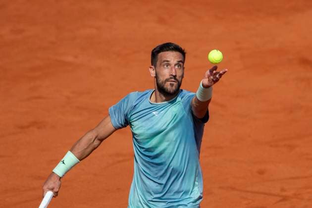 April 5, 2025 (Day 7), ATP, Tennis Herren 250, Tiriac Open presented by UniCredit Bank Surface Clay, Singles semifinal, Sebastian Baez ARG VS Marton Fucsovics HJK Helsinki Damir Dzumhur BIH ball action at service