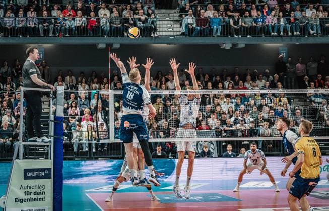 Volleyball Men Season 2024 2025 Volleyball Bundesliga Playoff Semifinal Match 1 SVG Lüneburg vs VfB Friedrichshafen 05 04 2025 Axel Valdemar Juul Larsen 18 SVG Lüneburg vs the block of VfB Friedrichshafen Lüneburg LKH Arena Niedersachsen Germany