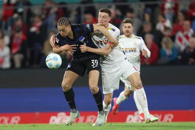 Derry Scherhant Hertha BSC Berlin and Eric Martel 1 FC Koeln battle for the ball during the 2 Bundesliga match between 1 FC Köln and Hertha BSC Berlin at RheinEnergieStadion on March 05, 2025 in Cologne, Germany, Germany Photo by Oliver Kaelke Defodi Images Derry Scherhant Hertha BSC Berlin and Eric Martel 1 FC Koeln battle for the ball during the 2 Bundesliga match between 1 FC Köln and Hertha BSC Berlin at RheinEnergieStadion on April 5, 2025 in Cologne, Germany Photo by Oliver Kaelke Defodi Images DFB DFL REGULATIONS PROHIBIT ANY USE OF PHOTOGRAPHS AS IMAGE SEQUENCES AND OR QUASI VIDEO Photo by Oliver Kaelke DeFodi Images