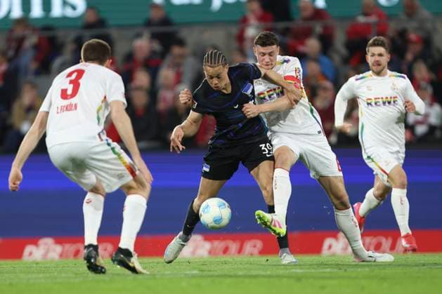 Derry Scherhant Hertha BSC Berlin and Eric Martel 1 FC Koeln battle for the ball during the 2 Bundesliga match between 1 FC Köln and Hertha BSC Berlin at RheinEnergieStadion on March 05, 2025 in Cologne, Germany, Germany Photo by Oliver Kaelke Defodi Images Derry Scherhant Hertha BSC Berlin and Eric Martel 1 FC Koeln battle for the ball during the 2 Bundesliga match between 1 FC Köln and Hertha BSC Berlin at RheinEnergieStadion on April 5, 2025 in Cologne, Germany Photo by Oliver Kaelke Defodi Images DFB DFL REGULATIONS PROHIBIT ANY USE OF PHOTOGRAPHS AS IMAGE SEQUENCES AND OR QUASI VIDEO Photo by Oliver Kaelke DeFodi Images