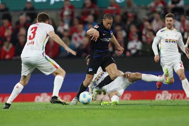 Derry Scherhant Hertha BSC Berlin and Eric Martel 1 FC Koeln battle for the ball during the 2 Bundesliga match between 1 FC Köln and Hertha BSC Berlin at RheinEnergieStadion on March 05, 2025 in Cologne, Germany, Germany Photo by Oliver Kaelke Defodi Images Derry Scherhant Hertha BSC Berlin and Eric Martel 1 FC Koeln battle for the ball during the 2 Bundesliga match between 1 FC Köln and Hertha BSC Berlin at RheinEnergieStadion on April 5, 2025 in Cologne, Germany Photo by Oliver Kaelke Defodi Images DFB DFL REGULATIONS PROHIBIT ANY USE OF PHOTOGRAPHS AS IMAGE SEQUENCES AND OR QUASI VIDEO Photo by Oliver Kaelke DeFodi Images