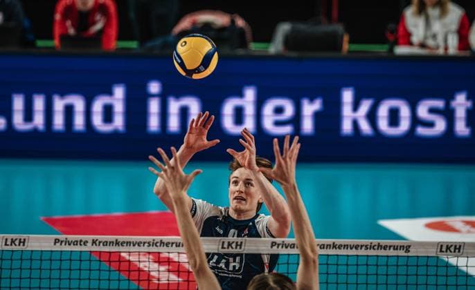 Volleyball mens season 2024 2025 Volleyball Bundesliga playoff semi-final match 1 SVG Lüneburg vs VfB Friedrichshafen 05 04 2025 Oskar Alve Espeland 9 SVG Lüneburg bounces the ball at the net Lüneburg LKH Arena Niedersachsen Germany