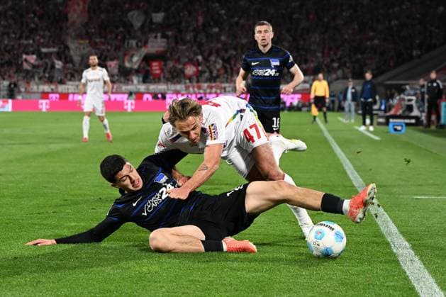 Ibrahim Maza Hertha BSC Berlin and Mathias Olesen 1 FC Koeln battle for the ball during the 2 Bundesliga match between 1 FC Köln and Hertha BSC Berlin at RheinEnergieStadion on April 05, 2025 in Cologne, Germany, Germany Photo by Ralf Treese DeFodi Images Ibrahim Maza Hertha BSC Berlin and Mathias Olesen 1 FC Koeln battle for the ball during the 2 Bundesliga match between 1 FC Köln and Hertha BSC Berlin at RheinEnergieStadion on April 5, 2025 in Cologne, Germany Photo by Ralf Treese DeFodi Images DFB DFL REGULATIONS PROHIBIT ANY USE OF PHOTOGRAPHS AS IMAGE SEQUENCES AND OR QUASI VIDEO Photo by Ralf Treese DeFodi Images