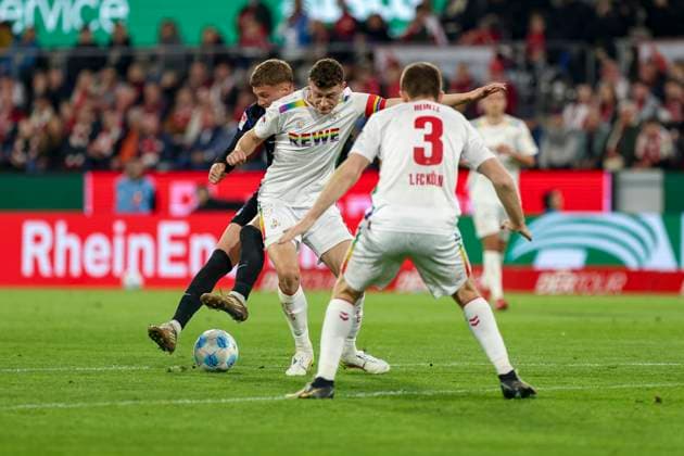 Cologne, Germany, 05 04 25 Michael Bruno Dominique Cuisance Hertha BSC and Eric Martel 1 FC Köln fighting for the ball during the 2 Bundesliga match between 1 FC Köln vs Hertha BSC Berlin at RheinEnergie Stadion Köln RheinEnergie Stadion North Rhine Westphalia Germany Copyright: xBrauer-Fotoagenturx xAdrianxSchlx