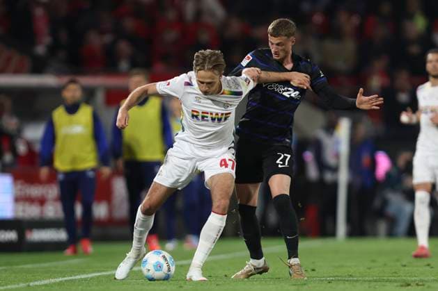 Mathias Olesen 1 FC Koeln and Michael Cuisance Hertha BSC Berlin battle for the ball during the 2 Bundesliga match between 1 FC Koeln and Hertha BSC Berlin at RheinEnergieStadion on March 05, 2025 in Cologne, Germany, Germany Photo by Oliver Kaelke Defodi Images Mathias Olesen 1 FC Koeln and Michael Cuisance Hertha BSC Berlin battle for the ball during the 2 Bundesliga match between 1 FC Köln and Hertha BSC Berlin at RheinEnergieStadion on April 5, 2025 in Cologne, Germany Photo by Oliver Kaelke Defodi Images DFB DFL REGULATIONS PROHIBIT ANY USE OF PHOTOGRAPHS AS IMAGE SEQUENCES AND OR QUASI VIDEO Photo by Oliver Kaelke DeFodi Images