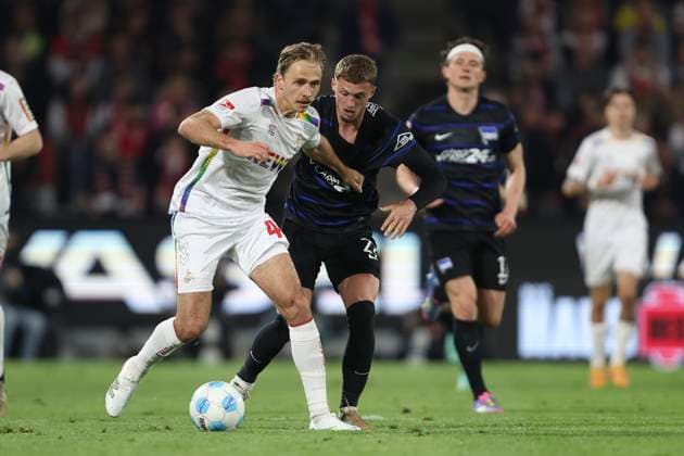 Mathias Olesen 1 FC Koeln and Michael Cuisance Hertha BSC Berlin battle for the ball during the 2 Bundesliga match between 1 FC Koeln and Hertha BSC Berlin at RheinEnergieStadion on March 05, 2025 in Cologne, Germany, Germany Photo by Oliver Kaelke Defodi Images Mathias Olesen 1 FC Koeln and Michael Cuisance Hertha BSC Berlin battle for the ball during the 2 Bundesliga match between 1 FC Köln and Hertha BSC Berlin at RheinEnergieStadion on April 5, 2025 in Cologne, Germany Photo by Oliver Kaelke Defodi Images DFB DFL REGULATIONS PROHIBIT ANY USE OF PHOTOGRAPHS AS IMAGE SEQUENCES AND OR QUASI VIDEO Photo by Oliver Kaelke DeFodi Images