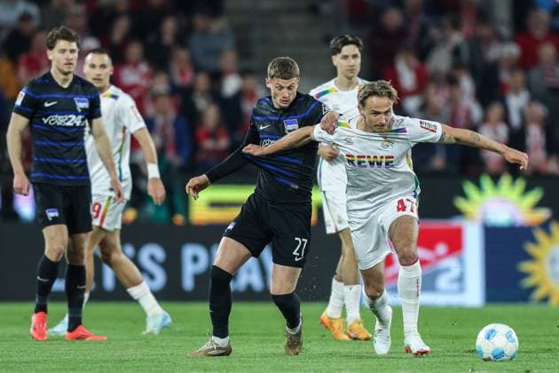 Soccer 2 Bundesliga 28 Matchday 1 FC Köln Hertha BSC Berlin on 05 04 2025 at RheinEnergieStadion in Cologne Michael Cuisance Berlin , left Mathias Olesen Köln , right DFL regulations prohibit any use of photographs as image sequences and or quasi video xJRx