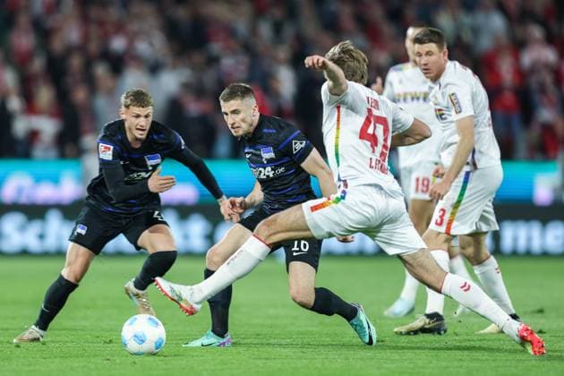 Soccer 2 Bundesliga 28 Matchday 1 FC Köln Hertha BSC Berlin on 05 04 2025 at RheinEnergieStadion in Cologne Jonjoe Kenny Berlin , left Mathias Olesen Köln , right DFL regulations prohibit any use of photographs as image sequences and or quasi video xJRx
