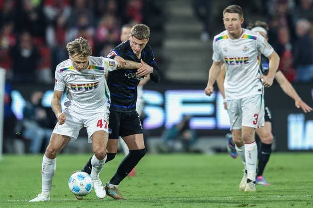 Soccer 2 Bundesliga 28 Matchday 1 FC Köln Hertha BSC Berlin on 05 04 2025 at RheinEnergieStadion in Cologne Mathias Olesen Köln , left Michael Cuisance Berlin , right DFL regulations prohibit any use of photographs as image sequences and or quasi video xJRx