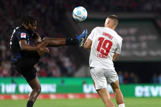 Deyovaisio Zeefuik Hertha BSC Berlin and Tim Lemperle 1 FC Koeln battle for the ball during the 2 Bundesliga match between 1 FC Köln and Hertha BSC Berlin at RheinEnergieStadion on April 05, 2025 in Cologne, Germany, Germany Photo by Ralf Treese DeFodi Images Deyovaisio Zeefuik Hertha BSC Berlin and Tim Lemperle 1 FC Koeln battle for the ball during the 2 Bundesliga match between 1 FC Köln and Hertha BSC Berlin at RheinEnergieStadion on April 5, 2025 in Cologne, Germany Photo by Ralf Treese DeFodi Images DFB DFL REGULATIONS PROHIBIT ANY USE OF PHOTOGRAPHS AS IMAGE SEQUENCES AND OR QUASI VIDEO Photo by Ralf Treese DeFodi Images