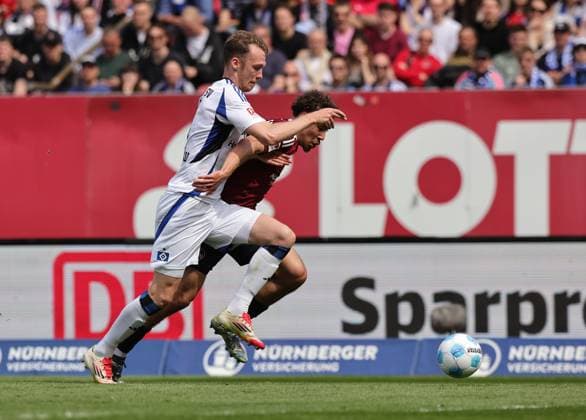 05 04 2025 Soccer Season 2024 2025 2 Soccer Bundesliga 28 Matchday 1 FC Nürnberg FCN Club Hamburger SV HSV Sportfoto Zink DaMa xdaxmax DFL regulations prohibit any use of photographs as image sequences and or quasi video only for editorial use Sebastian Schonlau 4, Hamburger SV HSV Rafael Lubach 18, 1 FC Nürnberg FCN