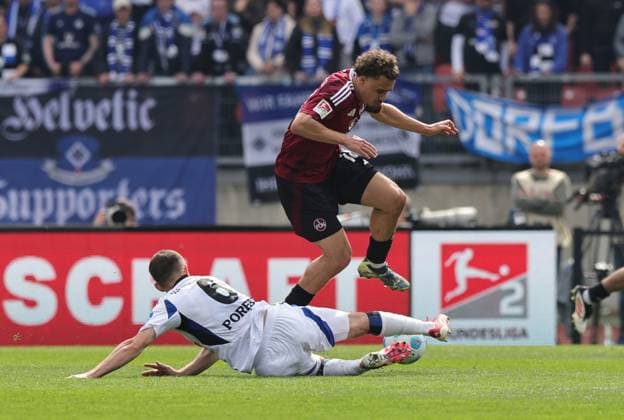 05 04 2025 Soccer Season 2024 2025 2 Soccer Bundesliga 28 Matchday 1 FC Nürnberg FCN Club Hamburger SV HSV Sportfoto Zink DaMa xdaxmax DFL regulations prohibit any use of photographs as image sequences and or quasi video only for editorial use Lukasz Poreba 6, Hamburger SV HSV Rafael Lubach 18, 1 FC Nürnberg FCN