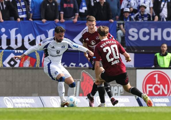 05 04 2025 Soccer Season 2024 2025 2 Soccer Bundesliga 28 Matchday 1 FC Nürnberg FCN Club Hamburger SV HSV Sportfoto Zink DaMa xdaxmax DFL regulations prohibit any use of photographs as image sequences and or quasi video only for editorial use Marco Richter 20, Hamburger SV HSV Florian Flick 6, 1 FC Nürnberg FCN Caspar Jander 20, 1 FC Nürnberg FCN