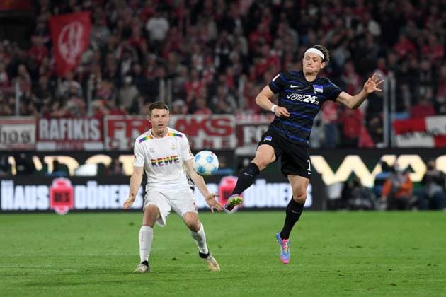 Dominique Heintz 1 FC Koeln and Fabian Reese Hertha BSC Berlin battle for the ball during the 2 Bundesliga match between 1 FC Koeln and Hertha BSC Berlin at RheinEnergieStadion on April 05, 2025 in Cologne, Germany, Germany Photo by Ralf Treese DeFodi Images Dominique Heintz 1 FC Koeln and Fabian Reese Hertha BSC Berlin battle for the ball during the 2 Bundesliga match between 1 FC Köln and Hertha BSC Berlin at RheinEnergieStadion on April 5, 2025 in Cologne, Germany Photo by Ralf Treese DeFodi Images DFB DFL REGULATIONS PROHIBIT ANY USE OF PHOTOGRAPHS AS IMAGE SEQUENCES AND OR QUASI VIDEO Photo by Ralf Treese DeFodi Images