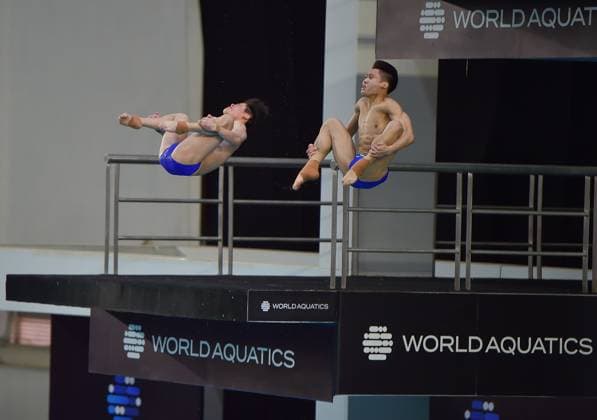 (250406) -- GUADALAJARA, April 6, 2025 -- Zhu Zifeng (L) Cheng Zilong of China compete during the men s 10m synchronized final at the World Aquatics Diving World Cup 2025 in Guadalajara, Jalisco, Mexico, on April 5, 2025. (Photo by Xinhua) (SP)MEXICO-JALISCO-GUADALAJARA-DIVING-WORLD CUP-MEN S 10M SYNCHRONIZED-FINAL AlejandroxAcosta 