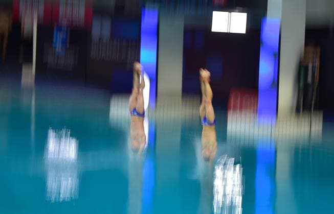 (250406) -- GUADALAJARA, April 6, 2025 -- Zhu Zifeng (L) Cheng Zilong of China compete during the men s 10m synchronized final at the World Aquatics Diving World Cup 2025 in Guadalajara, Jalisco, Mexico, on April 5, 2025. (Photo by Xinhua) (SP)MEXICO-JALISCO-GUADALAJARA-DIVING-WORLD CUP-MEN S 10M SYNCHRONIZED-FINAL AlejandroxAcosta 