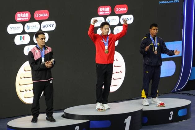 (250406) -- GUADALAJARA, April 6, 2025 -- Gold medalist Wang Zongyuan (C) of China, silver medalist Juan Manuel Celaya Hernandez (L) of Mexico, bronze medalist Luis Felipe Uribe Bermudez of Colombia react during the awarding ceremony of the men s 3m springboard final at the World Aquatics Diving World Cup 2025 in Guadalajara, Jalisco, Mexico, on April 5, 2025. (Photo by Xinhua) (SP)MEXICO-JALISCO-GUADALAJARA-DIVING-WORLD CUP-MEN S 3M SPRINGBOARD-FINAL DianaxMarquez 