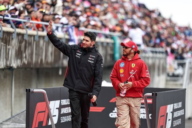 F1 Grand Prix Of Japan Esteban Ocon of France and the MoneyGram Haas F1 Team and Lewis Hamilton of Great Britain and Scuderia Ferrari look on before the F1 Grand Prix of Japan at Suzuka Circuit in Suzuka, Japan, on April 6, 2025. Suzuka Mie Japan  Copyright: xPaddockerx originalFilename:paddocker-f1grandp250406_npZ9x.jpg