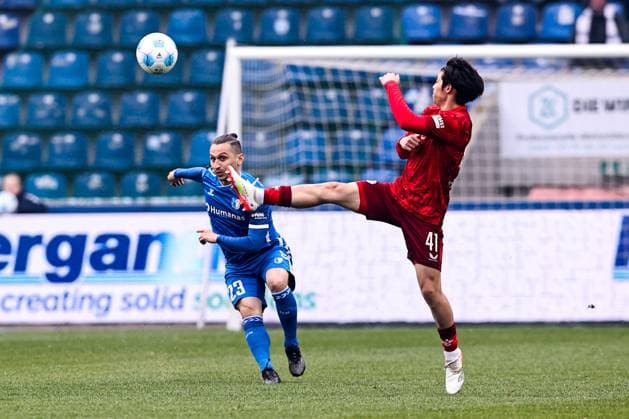 Baris Atik 1 FC Magdeburg,23 vs Daisuke Yokota 1 FC Kaiserslautern,41 2 Soccer Bundesliga Season 2024 2025 1 FC Magdeburg vs 1 FC Kaiserslautern at the Avnet Arena in Magdeburg Action,Soccer,Man,Men,Germany,06 04 2025