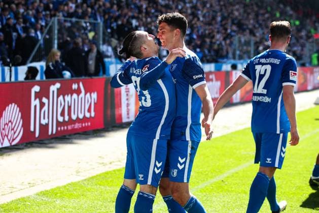 Goal celebration Goalscorer Baris Atik 1 FC Magdeburg,23 scores to 1 0 with Tobias Müller 1 FC Magdeburg,5 2 Soccer Bundesliga Season 2024 2025 1 FC Magdeburg vs 1 FC Kaiserslautern at the Avnet Arena in Magdeburg Action,Soccer,Man,Men,Germany,06 04 2025