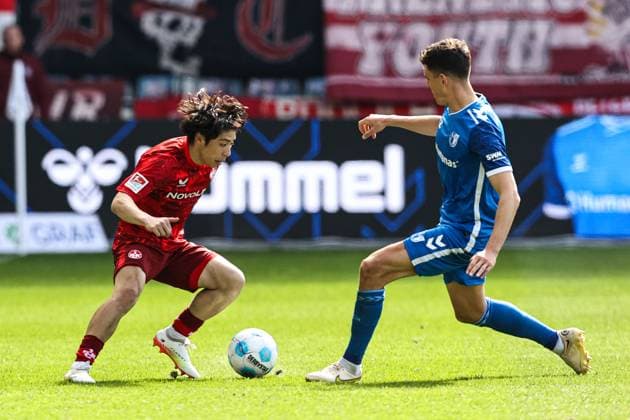 Daisuke Yokota 1 FC Kaiserslautern,41 vs Tobias Müller 1 FC Magdeburg,5 2 Soccer Bundesliga Season 2024 2025 1 FC Magdeburg vs 1 FC Kaiserslautern at the Avnet Arena in Magdeburg Action,Soccer,Man,Men,Germany,06 04 2025