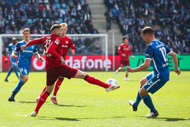 Luca Sirch 1 FC Kaiserslautern,31 vs Alexander Ahl Holmström 1 FC Magdeburg,12 2 Soccer Bundesliga Season 2024 2025 1 FC Magdeburg vs 1 FC Kaiserslautern at the Avnet Arena in Magdeburg Action,Soccer,Man,Men,Germany,06 04 2025