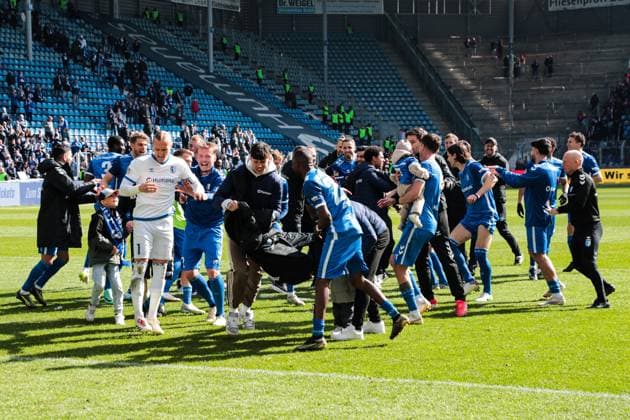 The team of 1 FC Magdeburg celebrates the victory in front of the fan block 2 Soccer Bundesliga season 2024 2025 1 FC Magdeburg vs 1 FC Kaiserslautern at the Avnet Arena in Magdeburg Action,Soccer,Man,Men,Germany,06 04 2025