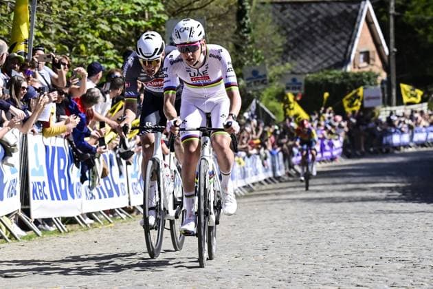 Dutch Mathieu van der Poel of Alpecin-Deceuninck and Slovenian Tadej Pogacar of UAE Team Emirates pictured in action on Oude Kruisberg during the men s race of the Ronde van Vlaanderen Tour des Flandres Tour of Flanders one day cycling race, 268,9km from Brugge to Oudenaarde, Sunday 06 April 2025. DIRKxWAEM  x119624186x